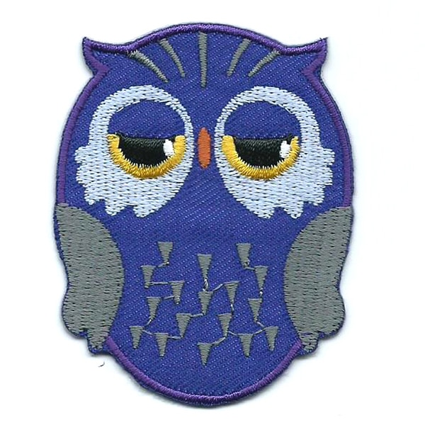 Purple iron on embroidered owl patch with black and yellow eyes.