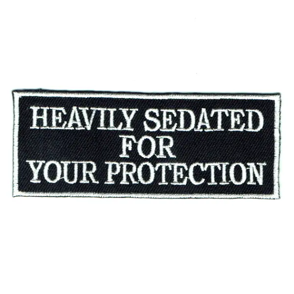 Iron on embroidered rectangular heavily sedated for your protection patch