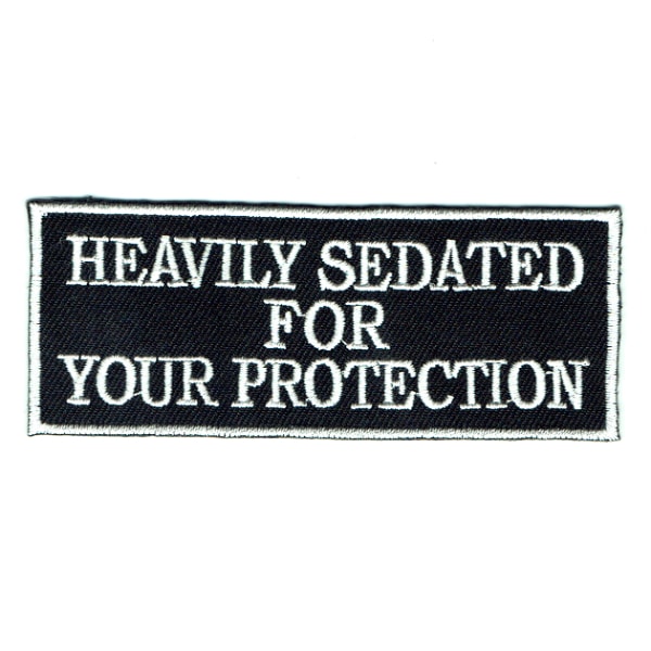 Iron on embroidered rectangular heavily sedated for your protection patch