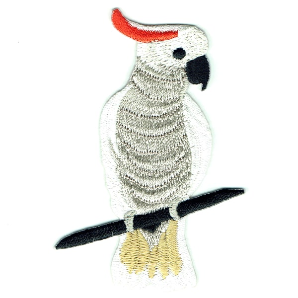 Iron on embroidered patch of a citron crested cockatoo on a branch