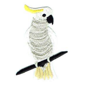 Embroidered patch of a sulphur crested cockatoo sitting on a tree branch