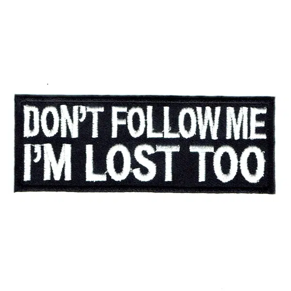 Black Iron on rectangle patch with Don't Follow Me I'M Lost Too Embroidered in white stitching