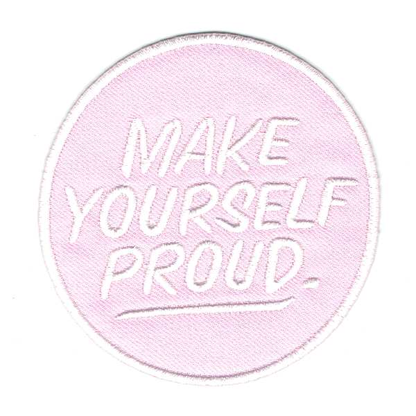 Round Iron On Patch Pink in colour with the words make yourself proud embroidered