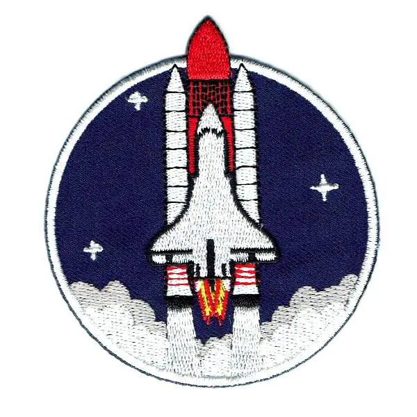 Space Shuttle Iron On Patch pictured blasting off into a dark blue sky.